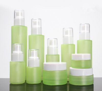 Emollient water spray bottle with transparent cover