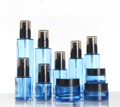 High grade cosmetic glass bottle,Blue bottle with black pump