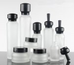 Cosmetic glass bottle with black dropper