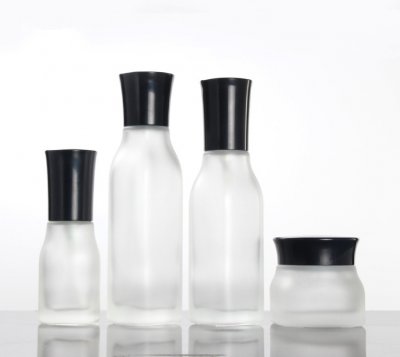Emulsion pressed frosted glass bottle